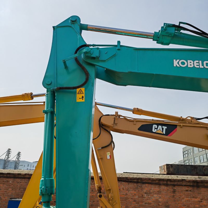 0.7m3 Capacidad de cubo 13 toneladas Color azul Excavadora de segunda mano Kobelco Sk 135