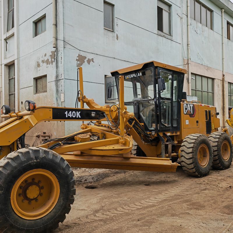 Excavadora usada nivelador de tierra Caterpillar CAT140K máquina de carreteras japonés de segunda mano motor de tractor en buenas condiciones