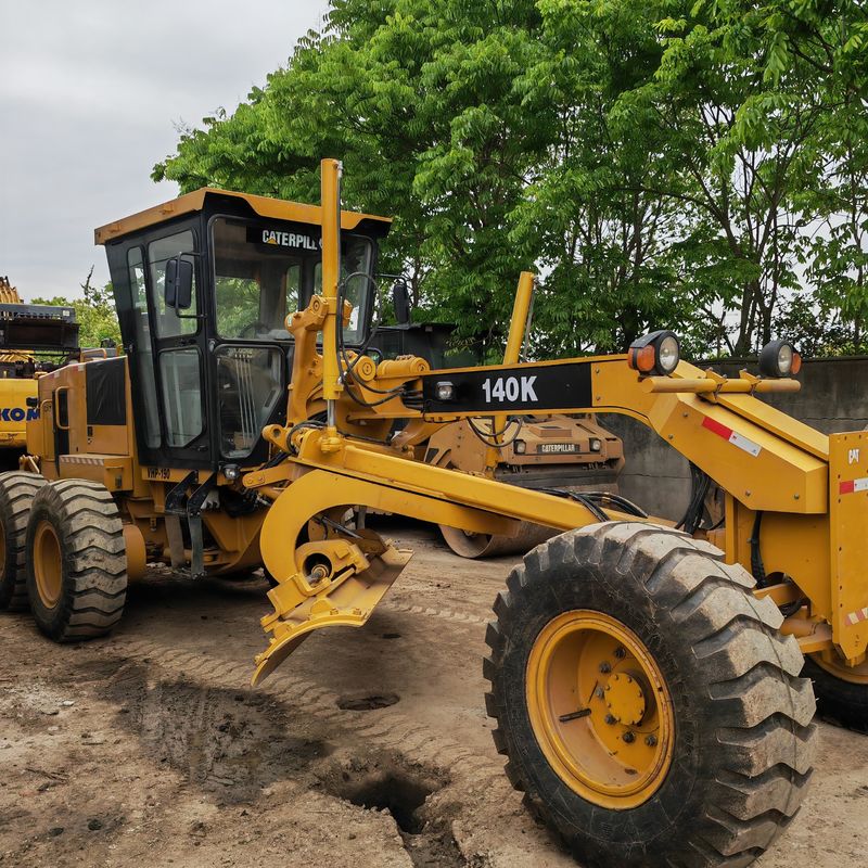 Excavadora usada nivelador de tierra Caterpillar CAT140K máquina de carreteras japonés de segunda mano motor de tractor en buenas condiciones