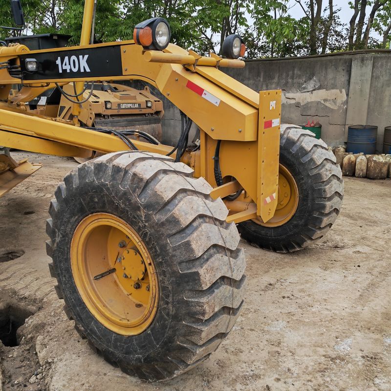 Excavadora usada nivelador de tierra Caterpillar CAT140K máquina de carreteras japonés de segunda mano motor de tractor en buenas condiciones